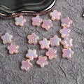 Dettaglio delle perle a stella rosa iridescente con finitura AB per gioielli fai-da-te - Venduto al Pezzo Dimensione Circa 23mm Diametro del Foro Circa 3,2mm / Rosa
