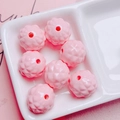 Macro detail of faceted pink pineapple acrylic beads with center holes for DIY crafting - Size Approx 17mm Hole Approx 2.5mm / Pink