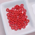Macro detail of red alloy wave beads with white polka dots for DIY jewelry making - 6.3mm / Red