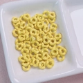 DIY yellow wave flower spacer beads with white dots for jewelry and phone chain making - 6.3mm / Yellow