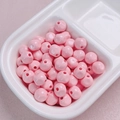 Macro detail of 10mm glossy pink acrylic beads for DIY jewelry and phone chains - 10mm / Pink