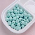Detailed close-up of 10mm light blue acrylic dopamine lacquered beads for DIY crafting - 10mm / Cyan