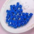 Macro shot of 12mm bright blue acrylic cube beads with holes for DIY jewelry - 12mm / Sapphire Blue