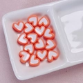Detailopname van oranje en witte hartkralen voor DIY-sieraden en telefoonhangers - Grootte ca. 12mm, gat ca. 2,5mm / 01-Oranje