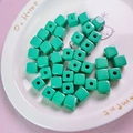 Detail of mint green 12mm acrylic cube beads with hole for DIY jewelry making - 12mm / Dark Green