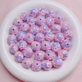 Makroaufnahme irisierender lila Blumenperlen mit 3D Schleifen für DIY-Schmuck - 16mm / Lila