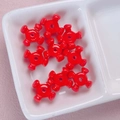 Detalle macro de cuentas de calabaza de acrílico rojo para creación de joyas DIY - 10x15mm / Rojo