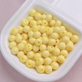 Perles rondes rayées jaune et blanc dans un plateau pour création de bijoux DIY - 12mm (Vendu à la Pièce) / Couleur solide Jaune