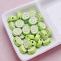 Detail of green and white swirl acrylic beads for DIY jewelry and phone chain making - Size Approx 10x12mm Hole Approx 2mm / Green