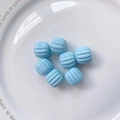 Macro detail of sky blue acrylic pumpkin shaped beads with vertical ribbed textures - Size approx 14.5*15.5mm, aperture approx 3.5mm (Single Piece) / Light Blue
