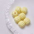 Macro shot of yellow pumpkin-shaped acrylic beads with center holes for DIY jewelry - Size approx 14.5*15.5mm, aperture approx 3.5mm (Single Piece) / Light Yellow