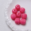 Detailed view of pink acrylic pumpkin beads and striped cylinder beads for DIY jewelry making - Size approx 14.5*15.5mm, aperture approx 3.5mm (Single Piece) / Rose Red