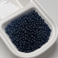 Macro view of 4mm matte black rubber-touch beads in white storage tray for DIY jewelry - Size 4 (5g/Approx 165pcs) / Black