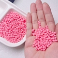 Detailed macro view of 4mm matte pink beads in palm showing small size and smooth texture - Size 4 (5g/Approx 165pcs) / Rose Pink (12)