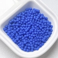 Macro view of matte navy blue 4mm seed beads in a white container for DIY jewelry making - Size 4 (5g/Approx 165pcs) / Royal Blue (18)