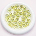 Close-up of 16mm light yellow translucent AB coating acrylic beads for jewelry making - 16mm / Transparent Light Yellow