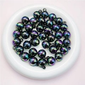 Macro detail of 16mm iridescent UV plated acrylic beads with metal ring for DIY jewelry - 16mm / Transparent Black