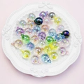 Close-up of 16mm iridescent UV coated acrylic beads with top hanging holes for DIY jewelry - 16mm / Random Mixed Colors