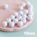 Perles en acrylique blanc 10mm macaron pour la création de bijoux DIY et de chaînes - Blanc