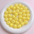 Macro shot of 16mm yellow acrylic beads with glitter hearts for DIY jewelry - 16mm / Yellow