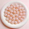 Macro shot of 16mm pink candy heart acrylic beads for DIY jewelry and phone chains - 16mm / Pink