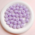 Macro shot of 16mm light purple glitter acrylic beads with heart patterns for DIY crafts - 16mm / Purple