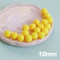 Perles rondes en acrylique jaune 10mm avec trou central pour bijoux faits main - Jaune
