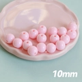 Perles en acrylique rose macaron de 10mm en plateau pour création de bijoux DIY - Rose Clair