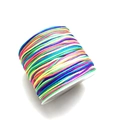 Rainbow gradient nylon cord for DIY jewelry braiding on a white plastic spool - Colorful