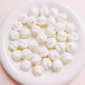 Detailed view of white spiral acrylic loose beads for DIY jewelry and phone chain making - Diameter 16mm Hole 3mm / White