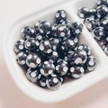Macro detail of 12mm black resin polka dot beads for DIY jewelry making and crafts - Diameter 12mm (2.8mm Hole) / Black