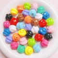 Close-up of colorful poop-shaped acrylic beads for DIY jewelry and phone chain making - Diameter 16mm Hole 3mm / Multicolor