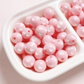 Macro detail of 12mm pink resin beads with white polka dots for DIY jewelry making - Diameter 12mm (2.8mm Hole) / Pink