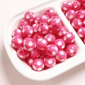 Detailed view of pink polka dot resin beads in a tray for DIY jewelry making - Diameter 12mm (2.8mm Hole) / Rose Red