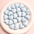 Sky blue heart-shaped loose beads for DIY jewelry making on a white ceramic plate - 20mm / Light Blue