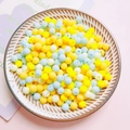 Detail of 6mm matte acrylic beads in yellow, blue and white for DIY craft making - Blue Yellow Series