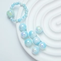 Ensemble de perles et bague aurore bleu clair en acrylique avec fini nacré dégradé - Bleu Blanc