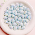 Macro-opname van iriserende lichtblauwe spookvormige acrylkralen voor DIY-sieraden - Klein 14x18.5mm / Blauw