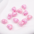 Pink heart-shaped beads with pearlescent finish and horizontal holes for DIY jewelry - Pink