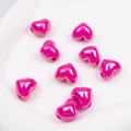 Vibrant rose pink heart shaped resin beads with a high gloss finish for DIY jewelry crafts - Rose Red