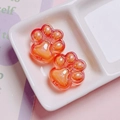 Macro detail of two orange acrylic cat paw charms for DIY phone chain accessories - Single Piece (Approx. 26mm) / Orange