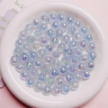Makroansicht blauer irisierender Leuchtperlen für die DIY-Schmuckherstellung - 10mm / Hellblau