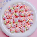 Macro shot of colorful DIY acrylic beads with hand-painted Lucky text on a white plate - Pink Purple Cream LUCKY Letter Style (05) / 16mm