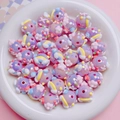 Close-up of hand-painted lavender acrylic beads with cloud and rainbow patterns - Purple Cloud Rainbow Style (02) / 16mm