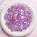 Detailed macro view of purple UV coated iridescent acrylic beads with center holes for DIY crafts - 16mm Diameter 3mm Hole / Lavender Purple