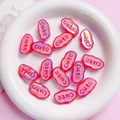 Detailed view of pink translucent acrylic cloud beads with cute lettering for DIY crafts - Luminous Rose Red