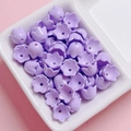 Macro detail of purple lily-of-the-valley acrylic flower beads for DIY jewelry making - Sold per piece / Purple