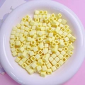 Macaron light yellow 7mm acrylic square beads with central holes for DIY jewelry - 100Pcs Per Pack / Bright Yellow