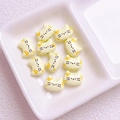 10 perline in lega a forma di testa di gatto da 12mm color crema per gioielli e ciondoli fai da te - Dimensioni Circa 9x12 / Giallo pallido