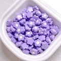 Macro view of light purple acrylic flower beads for DIY crafts in a white ceramic bowl - 10mm (1.2mm Hole) / Purple